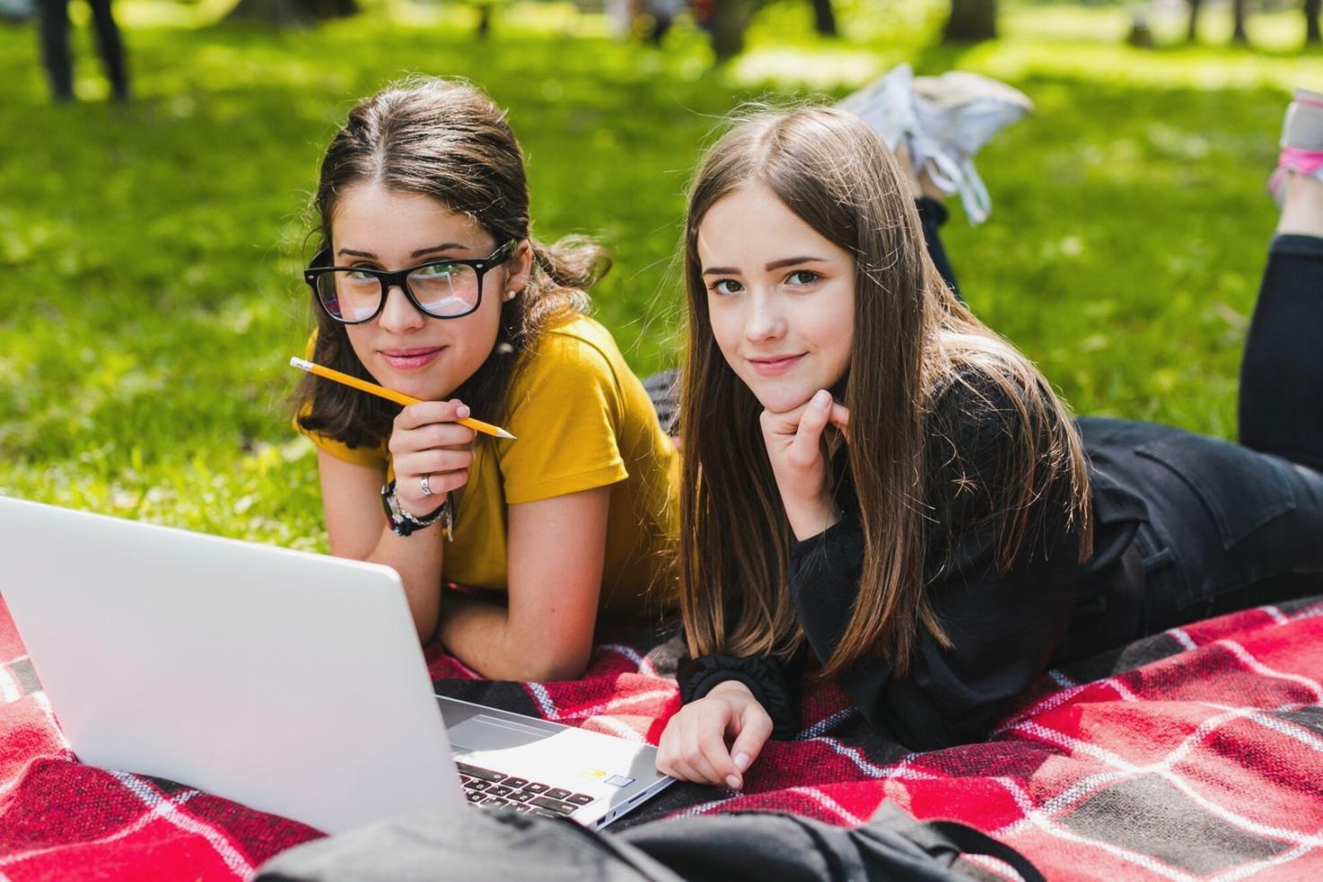 Modern office space with financial planning materials and strategic documents spread across conference table